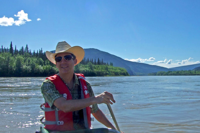 The author piloting a canoe down the Yukon River